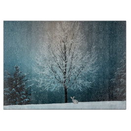 Frostiger Baum im Abend Schneidebrett