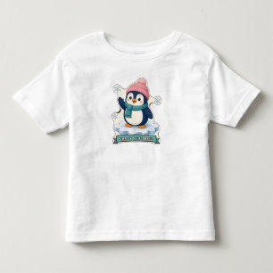Frostiger und fröhlicher Pinguin mit rosa Pom-Hut Kleinkind T-shirt