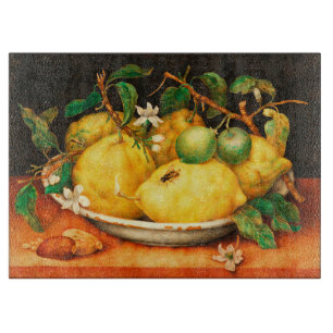 FRÜCHTE DER SAISON LEMONEN UND WEISSE BLUMEN SCHNEIDEBRETT