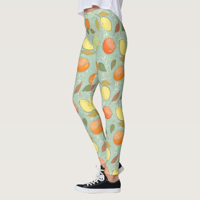Fruchtmuster mit Zitronen, Orangen Leggings (Links)