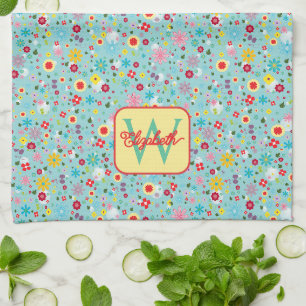 Frühlingsblumen auf aquablauem Monogramm Geschirrtuch