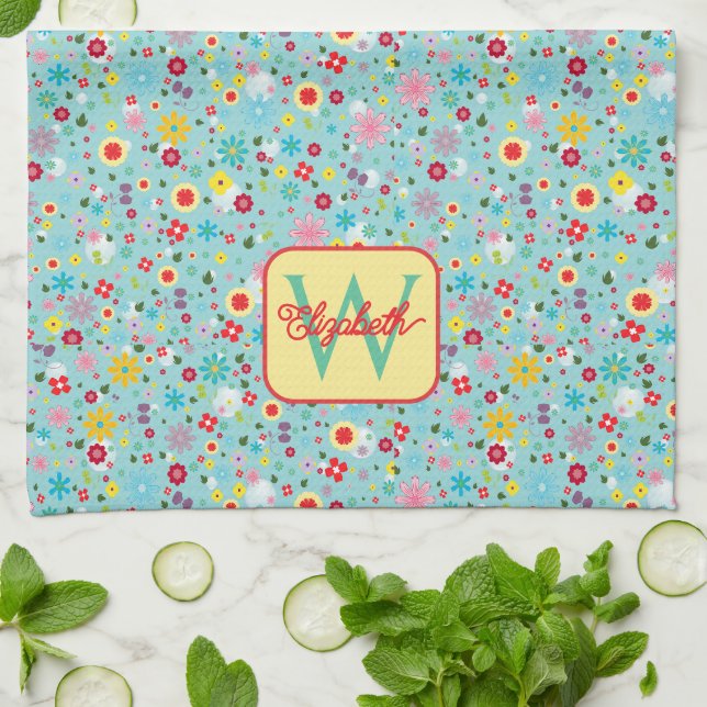 Frühlingsblumen auf aquablauem Monogramm Geschirrtuch (Gefaltet)