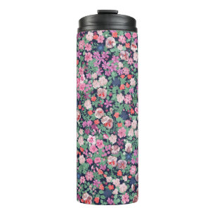 Frühlingsblumen: nahtloser Pflanzenaufdruck. Thermosbecher