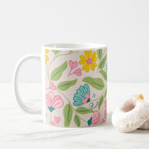 Frühlingsblumenmuster auf Rosa Kaffeetasse