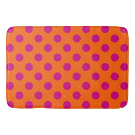 Fuchsia-Polka-Punkte auf Orange Badematte