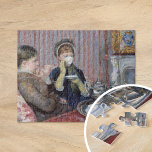 Fünf Uhr Tee | Mary Cassatt Puzzle<br><div class="desc">Fünf Tee der Uhr (1880) von Mary Cassatt porträtiert zwei elegant gekleidete Frauen, die einen Nachmittagstee in einer ruhigen, raffinierten Umgebung genießen. Das Gemälde unterstreicht Cassatts Liebe zum Detail und ihren geschickten Einsatz von Licht und Schatten, um ein Gefühl von Intimität und Realismus zu schaffen. Die Komposition erfasst die gesellschaftlichen...</div>