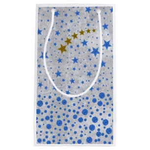 Funkelnd blaue Sterne auf abstraktem Silberpapier Kleine Geschenktüte