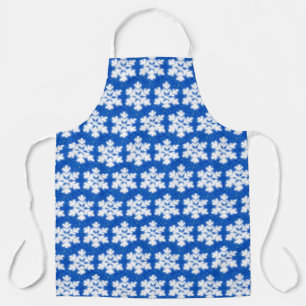 Funkelweiße Schneeflocken blauer Hintergrund Schürze