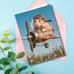 Funny Birthday Hamster Pilot & Airplane Aviator Karte<br><div class="desc">Die sonnige Geburtstagskarte mit einem Foto Hamster mit einem Pilothelm und einer Brille, die ein Vintages Flugzeug über einem Feld von Wildblumen fliegt. Im Inneren sind lustige Geburtstagwünsche. Ideal für Tierfreunde, Piloten oder Flieger. Passen Sie es mit Ihren eigenen Geburtstagswünschen an, um es besonders zu machen. Copyright steigt in Style...</div>