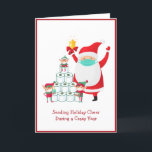 Funny Cartoon Santa mit Maske | Christmas | Covid Feiertagskarte<br><div class="desc">Auf dieser lustigen Urlaubskarte stehen ein paar geschäftige Elfen, die eine Reihe Toilettenpapier aufstapeln, während der Weihnachtsmann sie mit seiner Glocke anfeuert. Die Nachricht unten lautet "Holiday Cheer während eines Crazy Year" in einem roten Schriftart auf hellweißem Hintergrund. Die Farben sind grün, rot, braun und rosa. Ein weiterer Elf schmückt...</div>