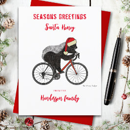 Funny Christmas Honey Badger auf einem Fahrrad Cus Feiertagspostkarte