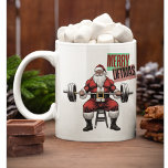 Funny Fitness Christmas Liftmas Barbell Santa Kaffeetasse<br><div class="desc">Fröhliche Liftmas - dieses festliche, auf Weihnachten ausgerichtete Shirt ist eine lustige Fitness Weihnachtsgrüße und das ideale Geschenk für Trainer oder Gymnastikpartner in Ihrem Leben. Dieses Shirt verfügt über ein super starkes und passendes Santa Claus, das einen Barbell hochzieht, komplett geschluckt. Der Weihnachtsmann, die fröhliche und faule Figur, die für...</div>