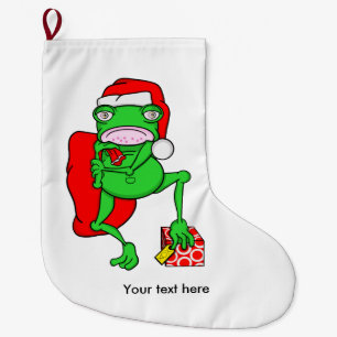 Funny Frog trägt einen Red-Santa-Claus-Hut Großer Weihnachtsstrumpf