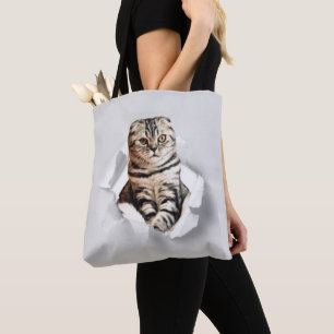 Funny Grey Cat Popping Through Torn Paper Illusion