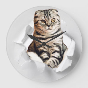 Funny Grey Cat Popping Through Torn Paper Illusion Große Wanduhr