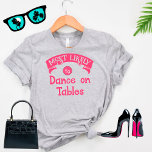 Funny Group Bachelorette Am wahrscheinlichsten Tan T-Shirt<br><div class="desc">Dieser lustige T - Shirt ist perfekt für ein paar gute Lachen. Es zeichnet sich durch ein humorvolles und leichtes Design aus, mit der perfekten Botschaft "Am wahrscheinlichsten tanzt man auf Tischen". Ein unglaublich witzig Design, das Sie sich gut fühlen lässt und mit einem Gefühl des Spaßes laut lachen lässt....</div>