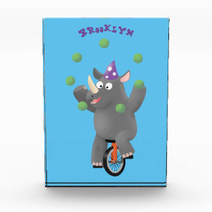Funny niedlicher Nashorn jonglieren auf Einrad Fotoblock