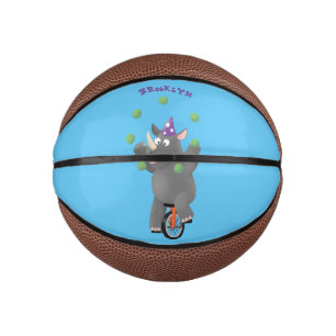 Funny niedlicher Nashorn jonglieren auf Einrad Mini Basketball