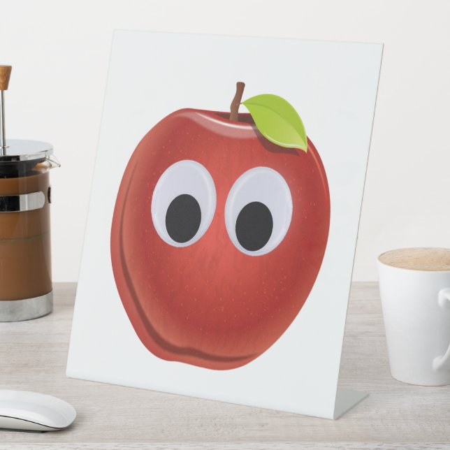 Funny Red Apple mit Googly Eyes Sockelschild (In Situ)