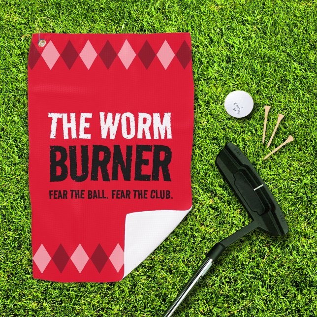 Funny Red Raute The Worm Burner ... Golfhandtuch (The Wormer Burner red argyle golf towel with putter, ball, and 3 tees on golf green)
