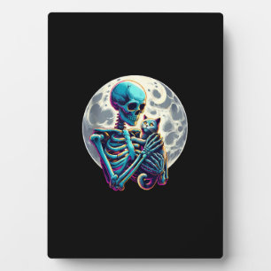 Funny Skeleton spielt mit einem Niedlichen Katzen Fotoplatte