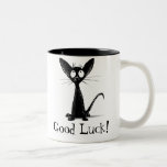 Funny Viel Glück Black Cat Zweifarbige Tasse<br><div class="desc">Diese lustige kleine coole Schwarze Katze-Illustration wurde von dem Kinderbuch-Illustrator und Künstler Paul Stickland handgezeichnet und ist seine meistverkaufte schwarze Katze zeichnend. Lädt lustigere kleine schwarze Katzen auf StrangeStore.</div>