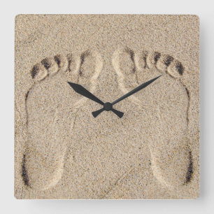 Fußabdruck in Sand Quadratische Wanduhr