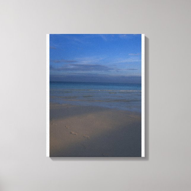 Fußabdrücke am Strand Leinwanddruck (Vorderseite)
