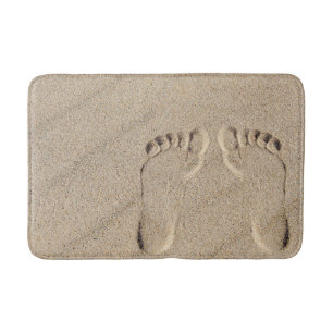Fußabdrücke in Sand Badematte