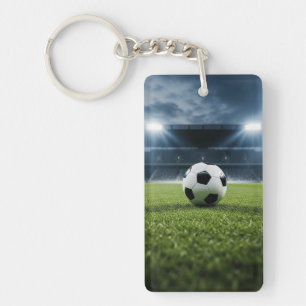 Fußball auf dem Grasfeld unter dem Licht des Stadi Schlüsselanhänger
