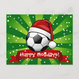 Fußball-Ball mit einer Weihnachtsmannmütze Weihnac Feiertagspostkarte