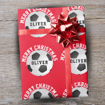 Fußball Balls Kinder Name Red Christmas Geschenkpapier<br><div class="desc">Fußball-Balls Kinder benennen rote Weihnachtswrapping Papier Blätter. Personalisieren Sie mit Ihrem Namen. Du kannst den Text Frohe Weihnachten ändern.</div>