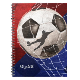 Fußball, der den roten, blauen Fußball des Mädchen Notizblock