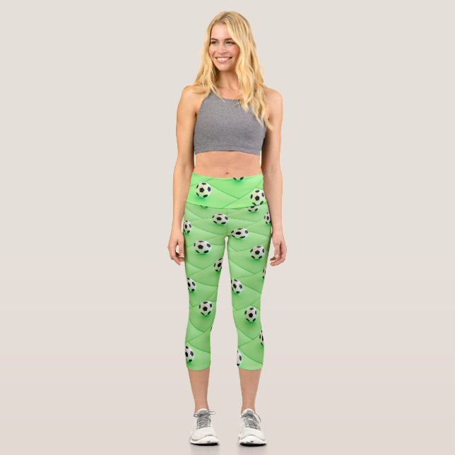 Fußball-Lüfterdesign mit blauem Hintergrund Capri Leggings (Vorderseite)