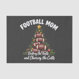 Fußball-Mama, die die Hallen zum Weihnachtsfußball Seidenpapier