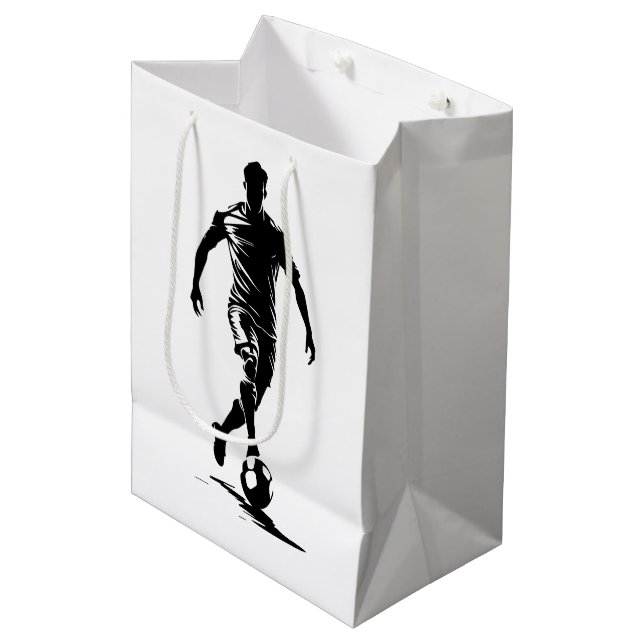 Fußball-Mann mit Ball-Design. Mittlere Geschenktüte (Vorderseite Schrägansicht)