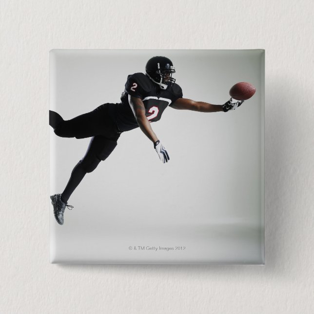 Fußball-Spieler springen in der Luft, um Ball zu f Button (Vorderseite)