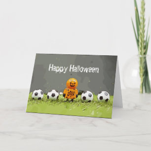 Fußballfröhliches Halloween mit Bälle auf grünem G Karte