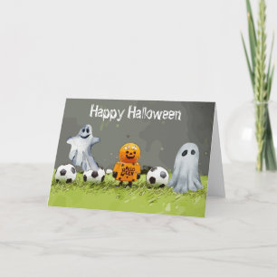 Fußballfröhliches Halloween mit Bälle auf grünem G Karte
