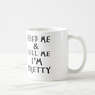 füttern Sie mich und sagen Sie mir, dass ich Tasse