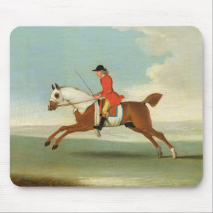Galoppierendes Rennpferd und angebrachter Jockey Mousepad