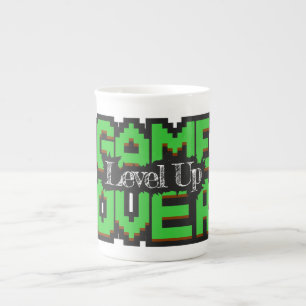 Game Over, Level Up: Pixelige Retro-Spielwelt Prozellantasse