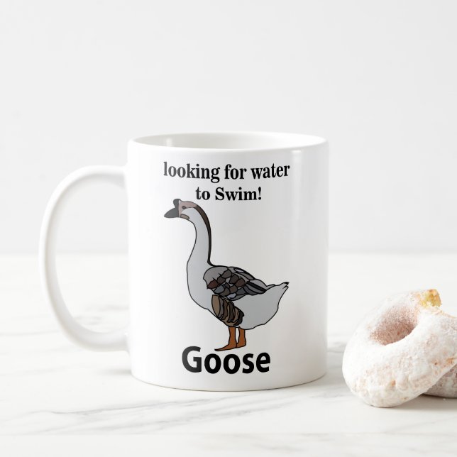 Gans sucht nach Wasser für schwimmende afrikanisch Kaffeetasse (Mit Donut)