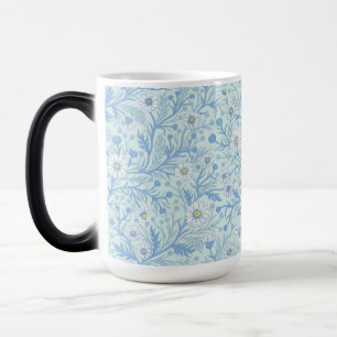 Gänseblümchen in weiß und blau auf Meeresglas Verwandlungstasse