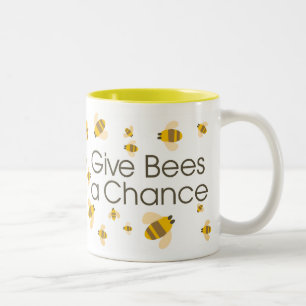 Geben Sie Bienen eine Möglichkeits-Tasse Zweifarbige Tasse