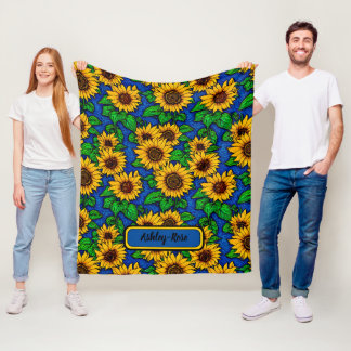 Geben Sie goldene Sonnenblumen und Blätter auf Dun Fleecedecke