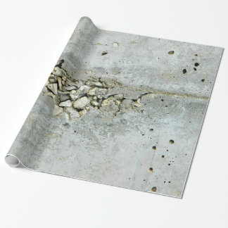 Gebrochene Betonmauer mit kleinen Steinen Geschenkpapier