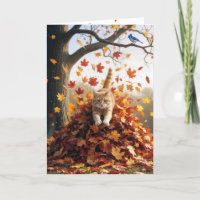Geburtstags-Ingwer-Katze im Herbst Leaf Pile