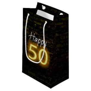 Geburtstags-Neon-50-Schild auf Ziegelstein Kleine Geschenktüte
