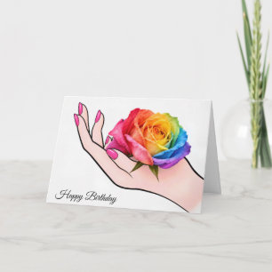 Geburtstagshand, die eine Regenbogenrose wiegt Karte